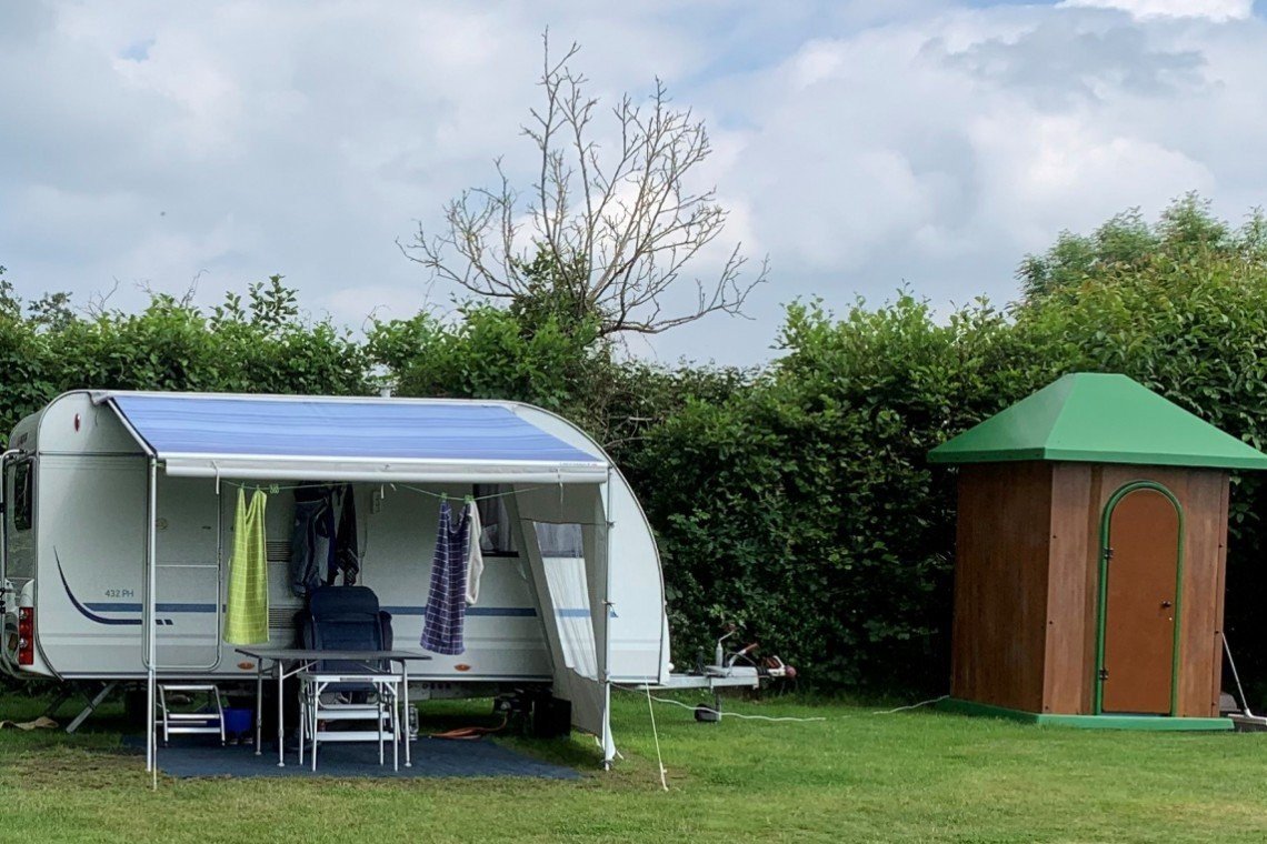 Kampeerplaats met privé sanitair